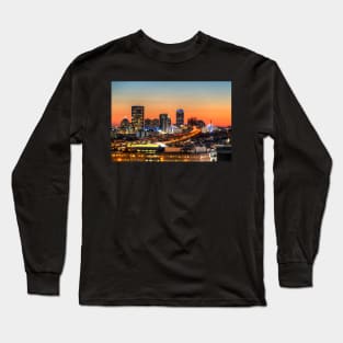 The Boston Skyline lit up blue at Sunset Long Sleeve T-Shirt